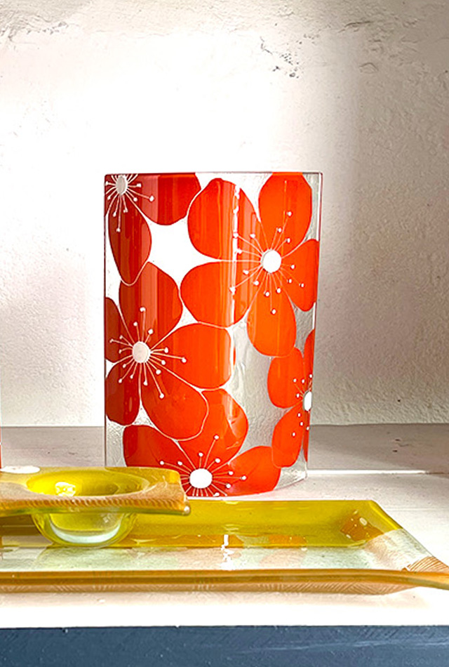 Orange Candle Screens on a shelf